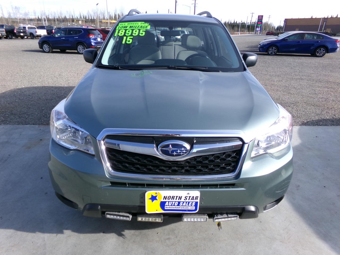 2015 Green Subaru Forester 2.5i Premium (JF2SJABC5FH) with an 2.5L H4 SOHC 16V engine, 6-Speed Automatic transmission, located at 2630 Philips Field Rd., Fairbanks, AK, 99709, (907) 458-0593, 64.848068, -147.780609 - Photo#1